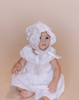 white baby dress with bonnet