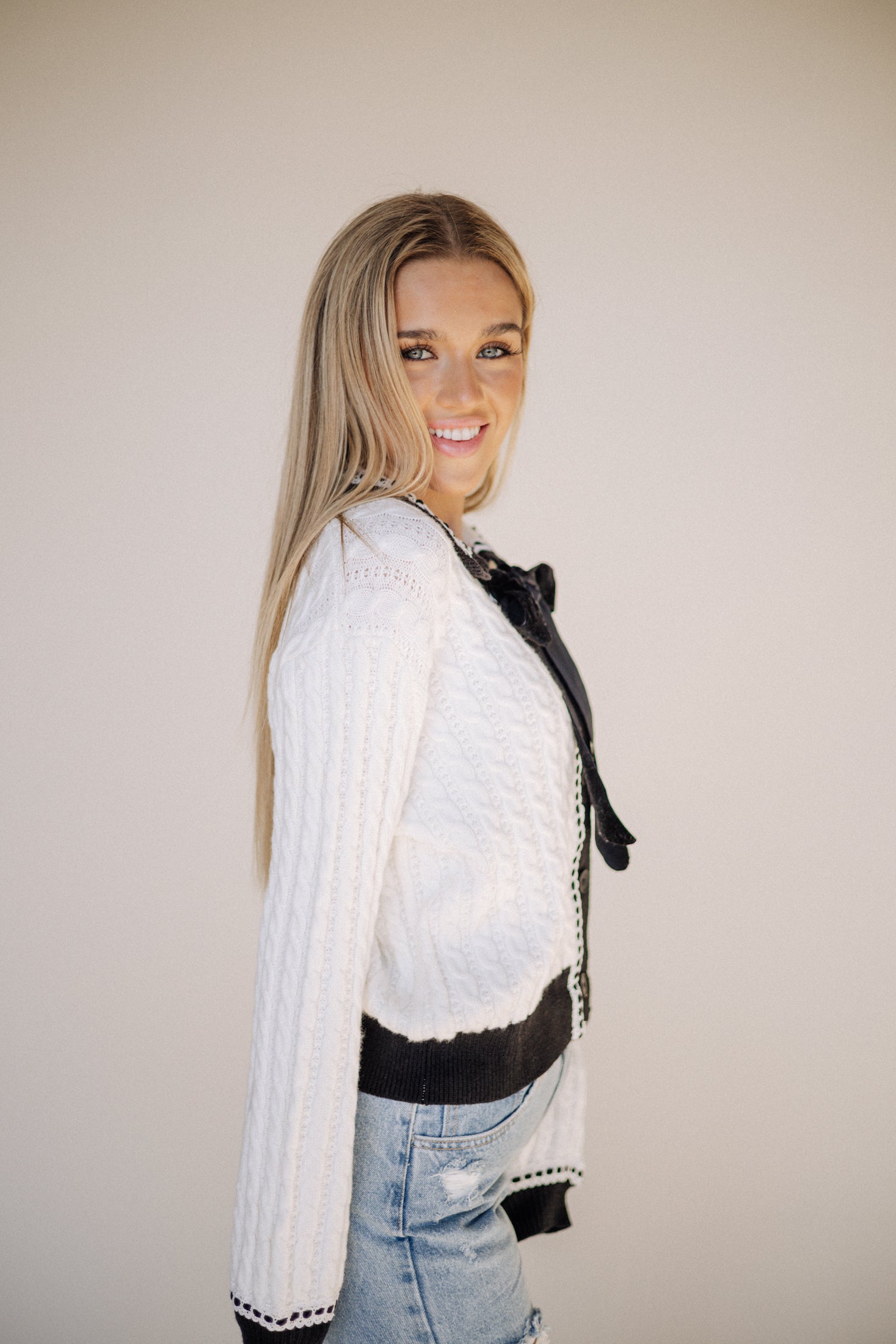 White cable knit sweater