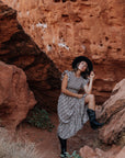 Black smocked dress