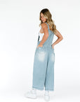 Light wash bib overalls denim